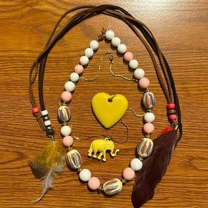 5 pc necklace and yellow heart pendant.